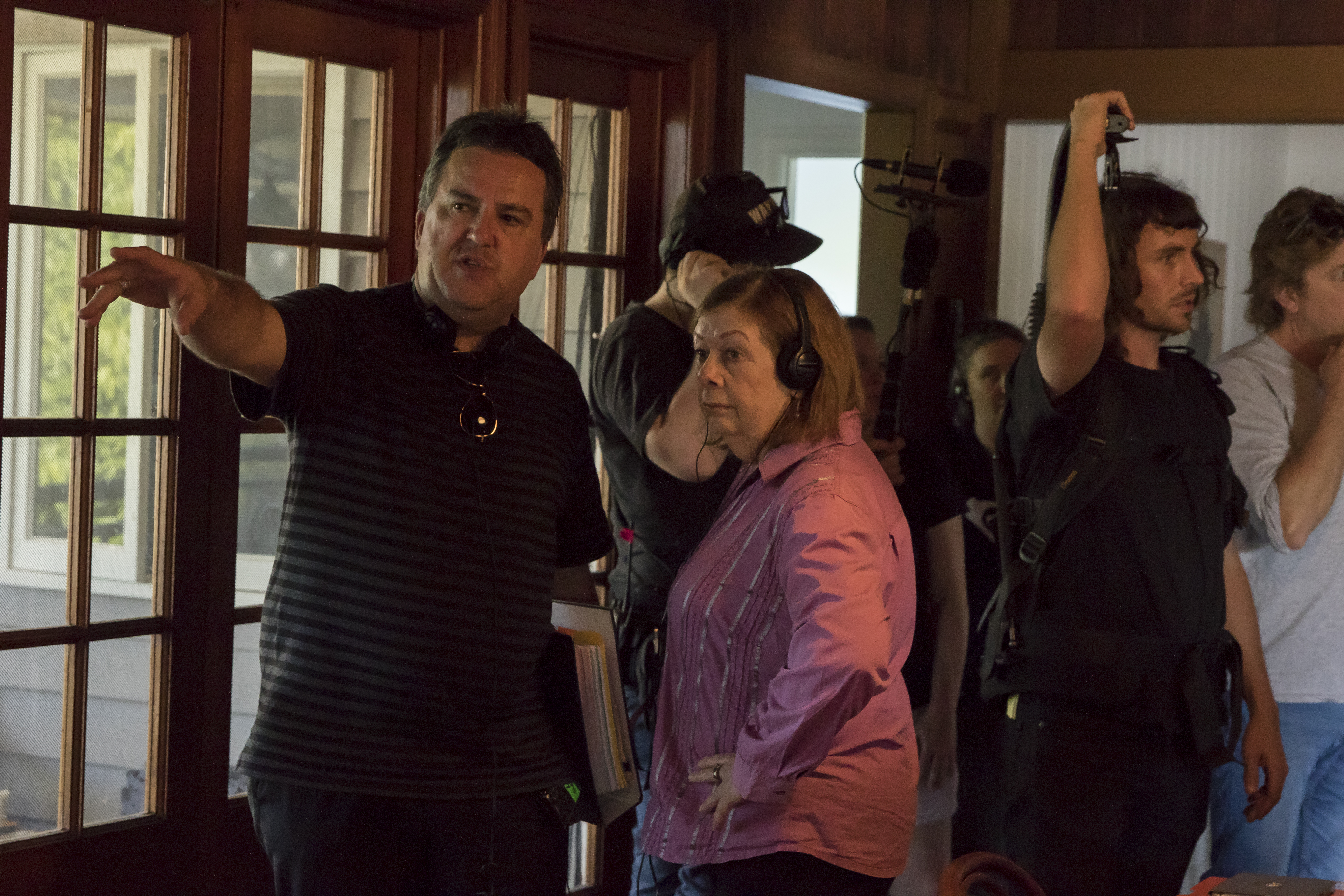 Stephen Corvini pointing on set during production